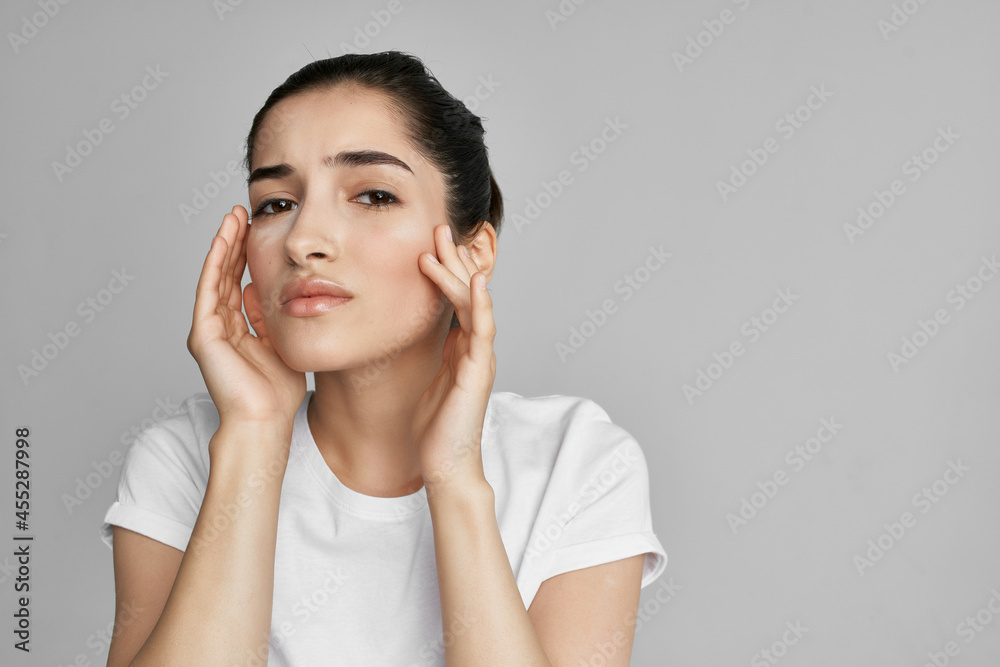 woman in white t-shirt headache problems negative woman in white t-shirt headache problems negative