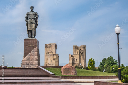 Panorama of the center of Shakhrisabz, Uzbekistan. Statue of Timur (Tamerlane), in the distance you can see the gates of the medieval palace Ak Saray photo