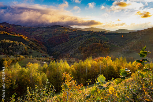 Moody autumn landscape in a rural Transylvanian village.