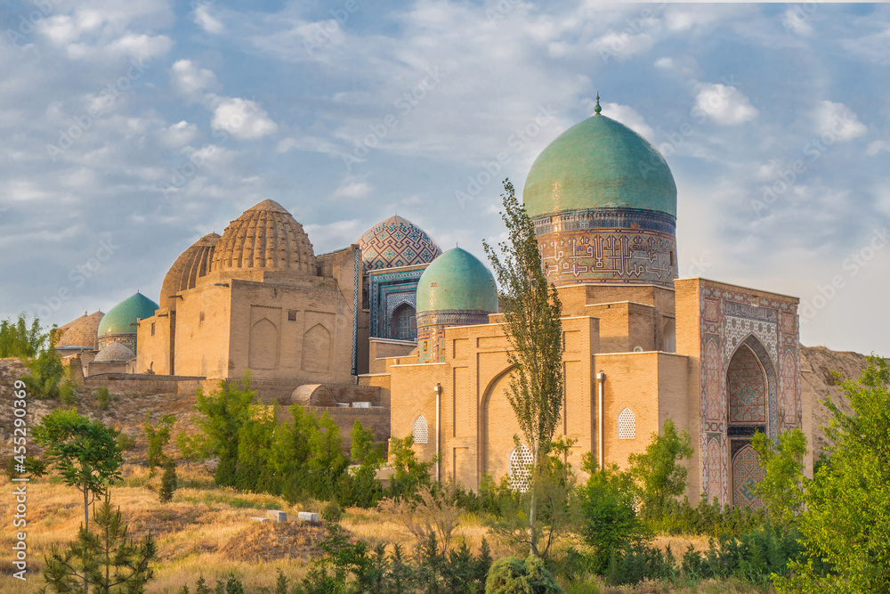 Panorama of the mausoleums of the Shakhi-Zinda complex in the sunbeams of the sunset. Buildings were built in XIV-XV centuries. Included in the UNESCO heritage. Shot in Samarkand, Uzbekistan