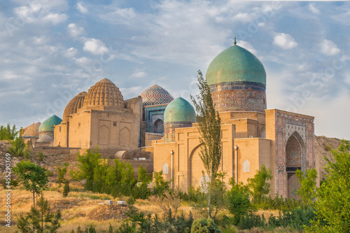 Panorama of the mausoleums of the Shakhi-Zinda complex in the sunbeams of the sunset. Buildings were built in XIV-XV centuries. Included in the UNESCO heritage. Shot in Samarkand, Uzbekistan