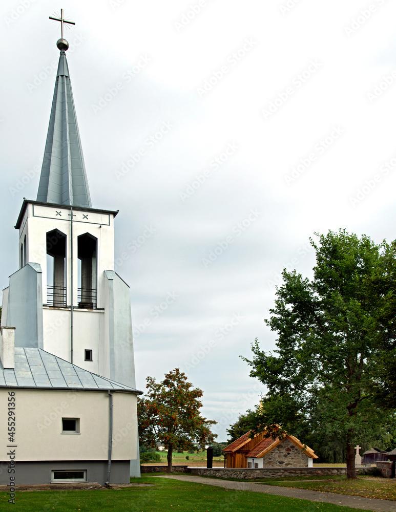 General view and architectural details of a brick Catholic chapel from 1863 and a wooden part added to it in 1905 in Pogorzalki in Podlasie, Poland. General view and architectural details of a brick Catholic chapel from 1863 and a wooden part added to it in 1905 in Pogorzalki in Podlasie, Poland.