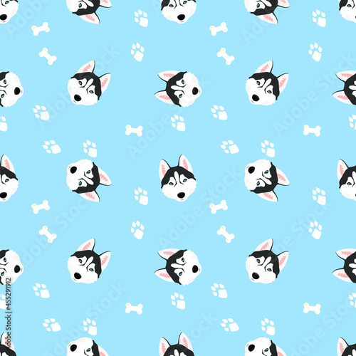 Husky dog ​​with blue eyes, white bones and paw marks on a blue background. Print for fabric, textile, paper, clothing. Seamless pattern Vector illustration