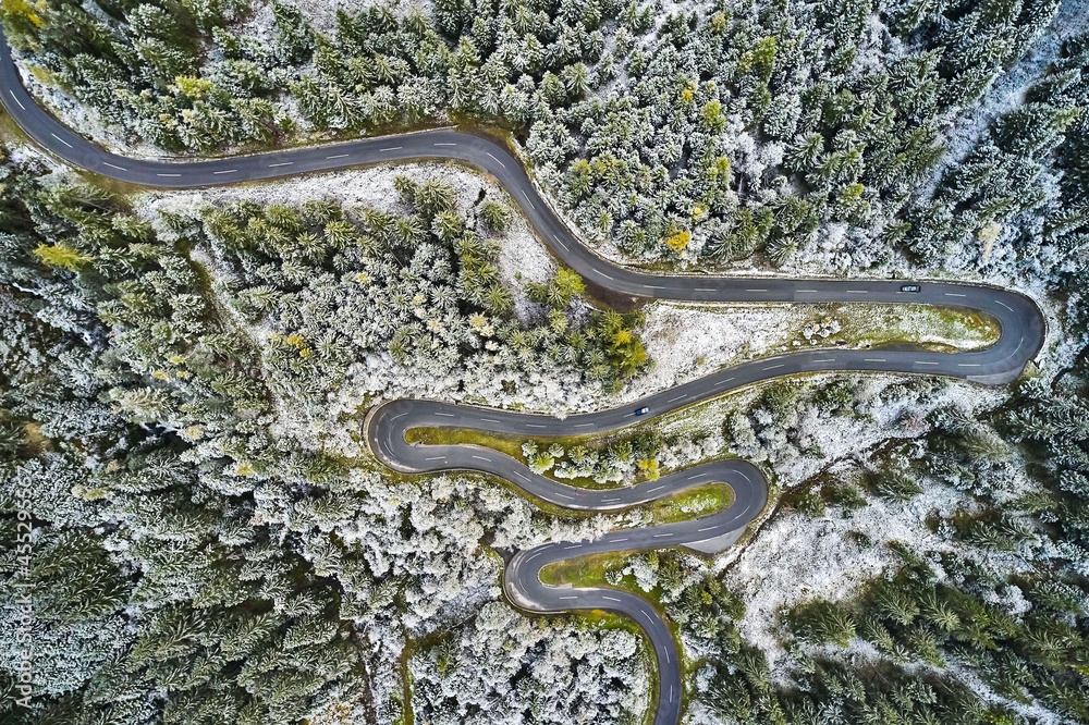 aerial view of road path on mountain cliff