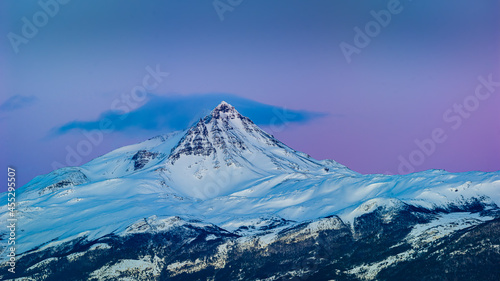 Snow covered mountain in the blue hour before sunrise in Patagonia  Chile