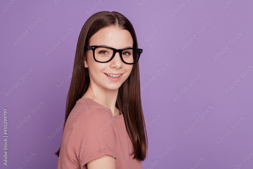 Portrait of young woman wearing glasses against violet background Portrait of young woman wearing glasses against violet background