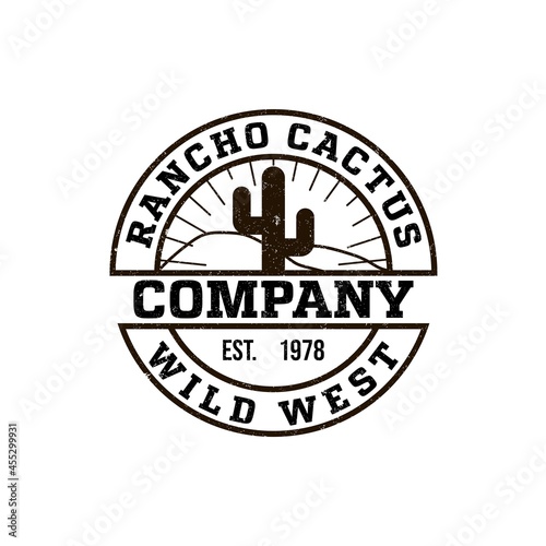 round logo ranch with a picture of a cactus. Vintage style, shabby background, monochrome colors. the emblem of the wild West