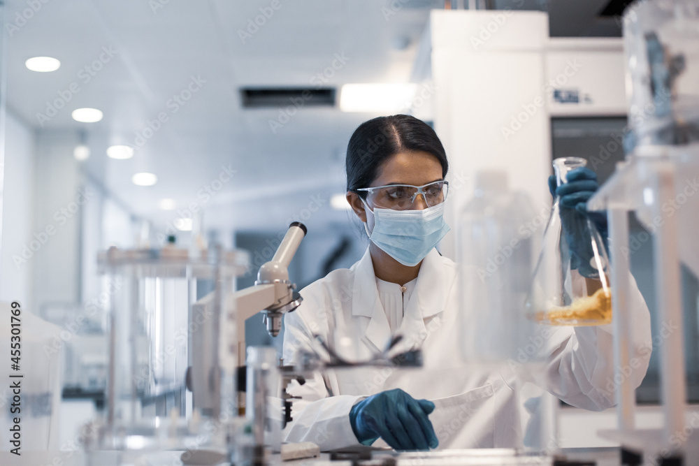 Female scientist working in a science laboratory Female scientist working in a science laboratory