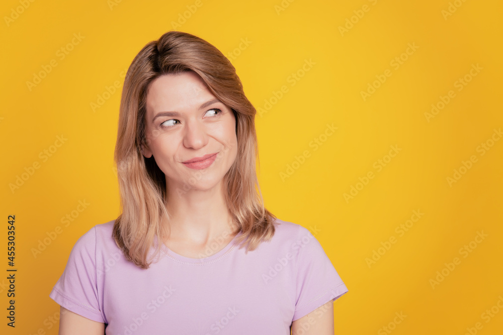 Portrait of dreamy inspired lady look blank space think thoughts on yellow background Portrait of dreamy inspired lady look blank space think thoughts on yellow background