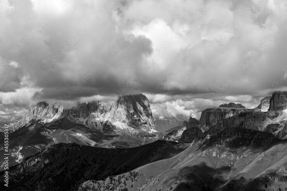 Sassopiatto, Sassolungo and Piz De Ciavazes mountains seen from Marmolada. Cloudy panorama of the Dolomites. Dolomites Alps , Trentino Alto Adige, Italy