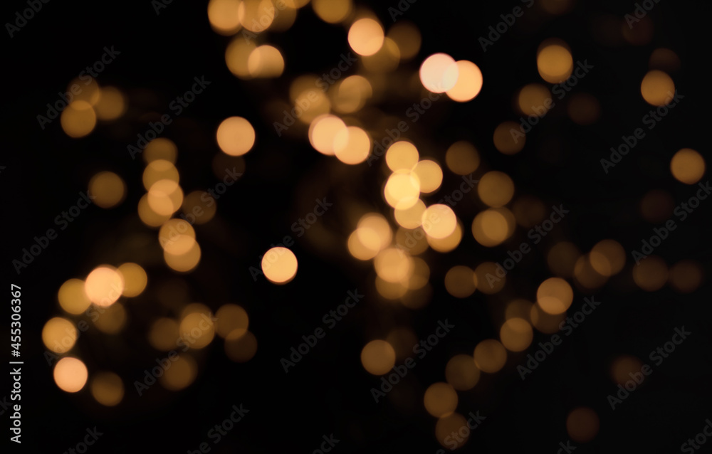 gold defocus lights on black background
