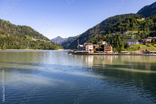 Amazing alpine scenery, Dolomites mountains. Beautiful lake lago di Alleghe, northern Italy (Belluno province)