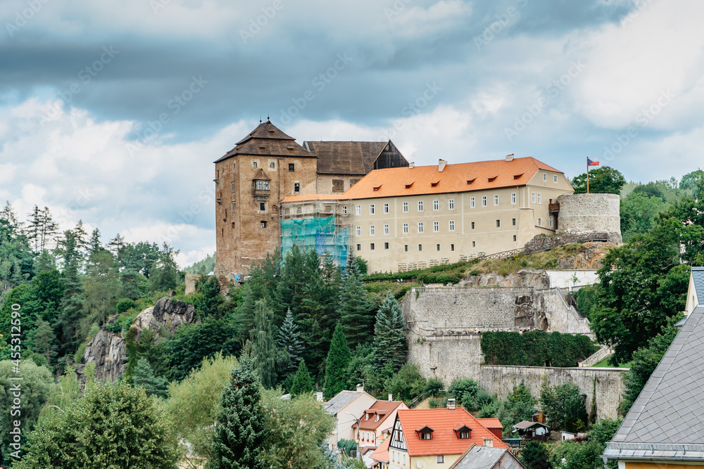 Gothic medieval castle,Renaissance palace and Baroque chateau Becov nad Teplou with Reliquary of St. Maurus,Czech Republic.Castle sets above deep valley,surronded by high forested hills.Scenic view