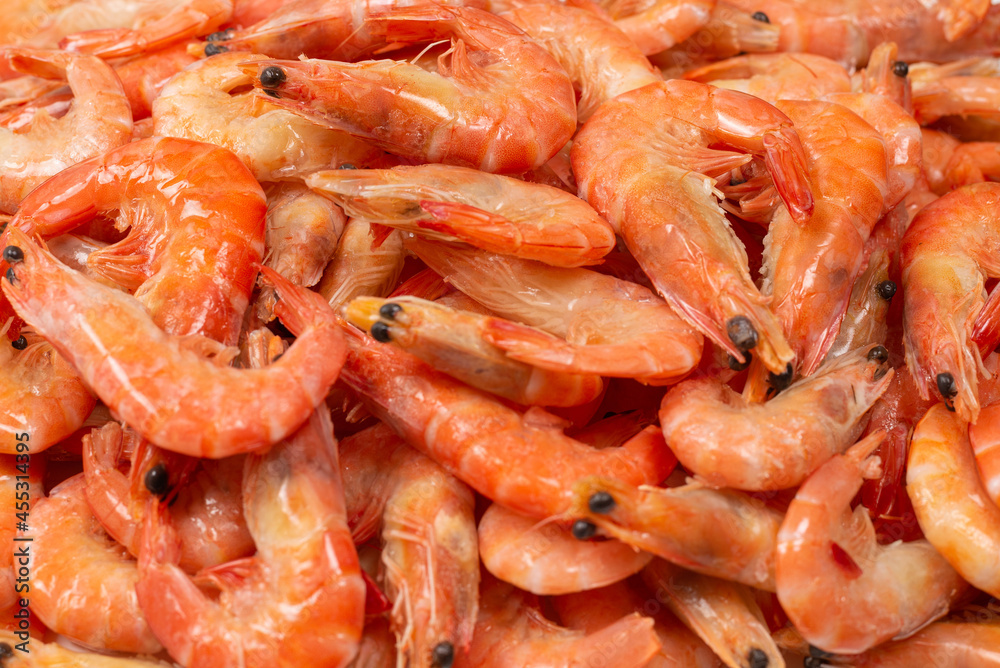Shrimps background texture. A lot of shrimps. Cooked shrimps. Shrimps background texture. A lot of shrimps. Cooked shrimps.