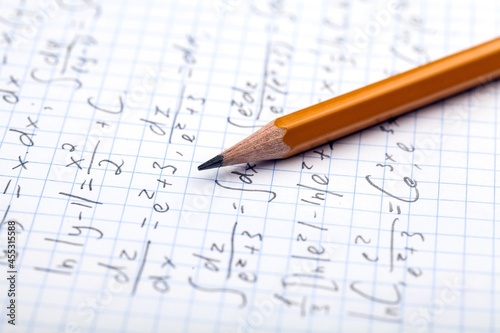 School Notebook with Mathematical Equations Close-Up