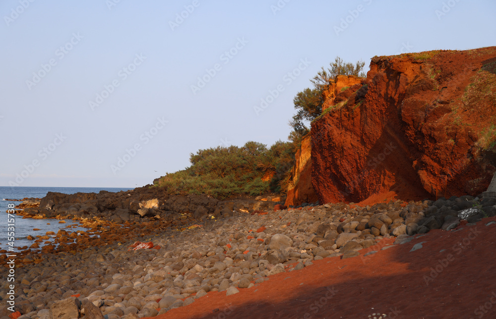 Naklejka premium Sunset colors of the rocks of Barro Vermelho, Graciosa island, Azores