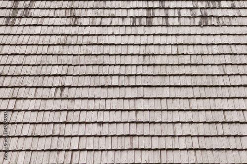 Old wooden roof. Horizontal view of shingles roof.