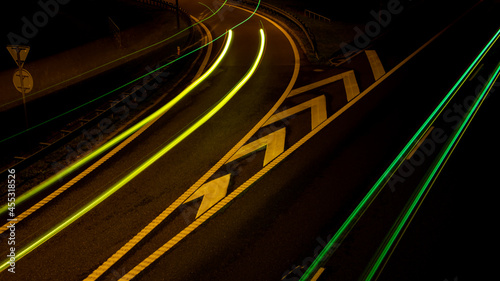 Night road lights. Lights of moving cars at night. long exposure red, blue, orange, multicolored