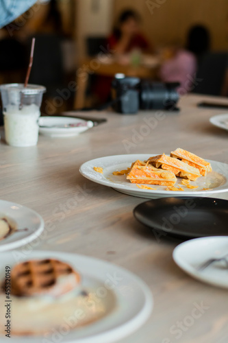 Pictures of dishes and desserts on the table