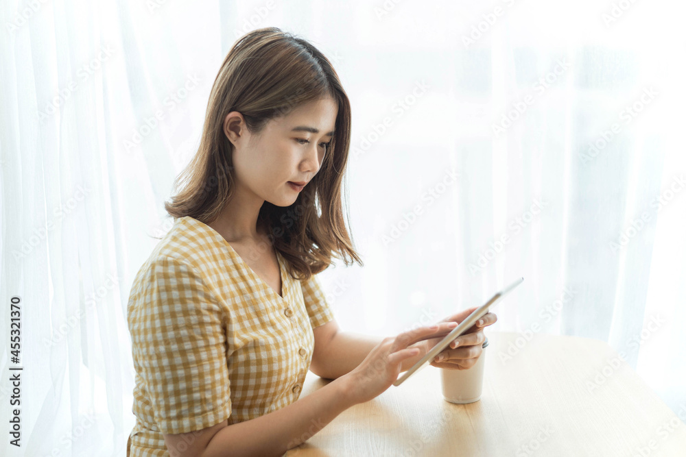 A young female officer summarizing data to create into an infographic for presentation A young female officer summarizing data to create into an infographic for presentation