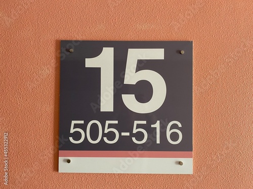 15th floor and apartment numbers in a multi-storey building
