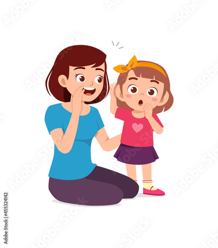young woman whisper secret with cute little girl
