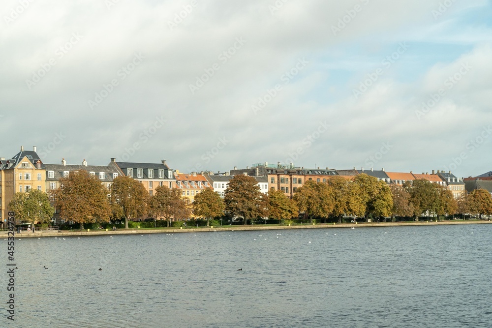 Copenhagen, Denmark. September 27, 2019: Landscape on the city canals with a view of buildings and houses. 