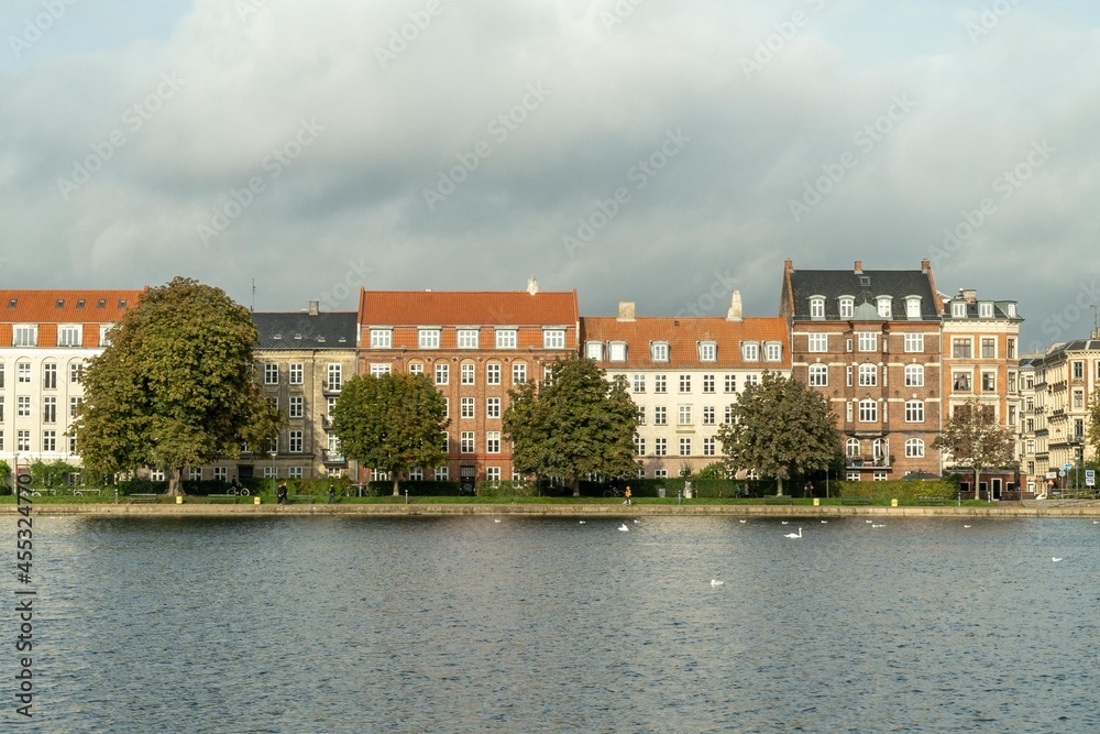 Copenhagen, Denmark. September 27, 2019: Landscape on the city canals with a view of buildings and houses. 