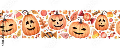 Watercolor saemless border. Halloween hand drawn endless pattern. Orange pumpkins, caramels, autumn leaves and another elements. Nice festive border.