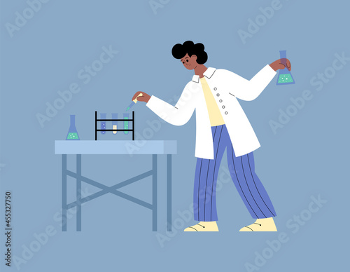 Male african american scientist create vaccine or medicine at science laboratory
