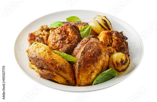 Stir-fried chicken breasts on plate isolated on white