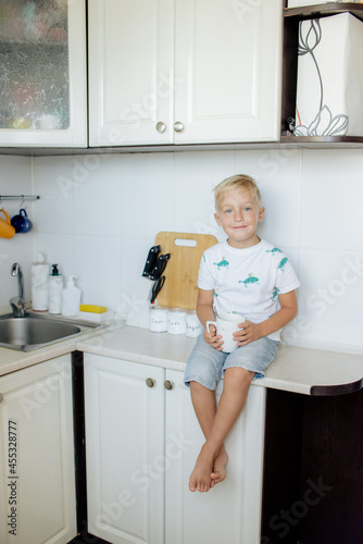 little child in kitchen