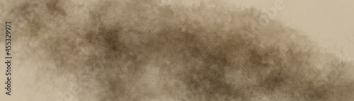 Old light brown paper parchment background design with distressed vintage stains and ink spatter and elegant antique beige color. 