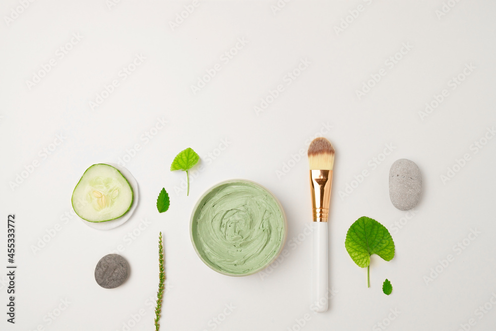 Cosmetic green cream in a jar top view background. Skin care, organic natural beauty products concept Cosmetic green cream in a jar top view background. Skin care, organic natural beauty products concept