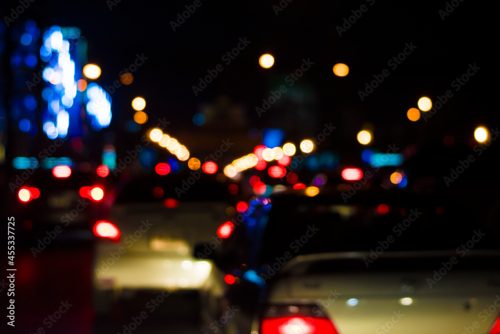 Blurred vision of traffic jams at night full of lights.