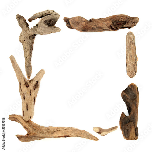 Natural driftwood abstract square background border on white background. Minimal rustic zen nature concept, copy space. © marilyn barbone