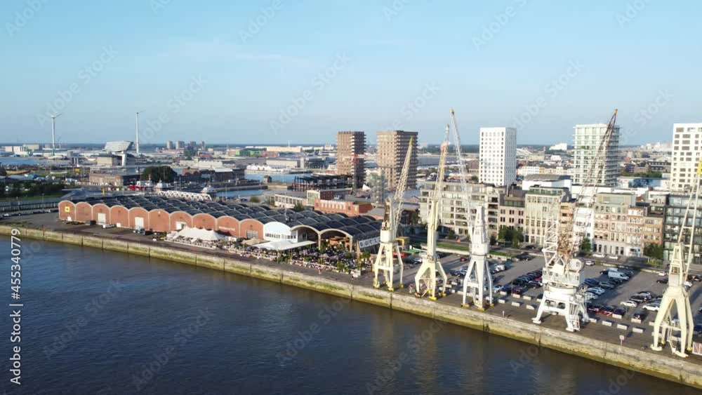Aerial drone video of the historical harbor cranes on the docks in Antwerp covering from the Waagnatie to Hangar 27 and the MAS museum Aerial drone video of the historical harbor cranes on the docks in Antwerp covering from the Waagnatie to Hangar 27 and the MAS museum
