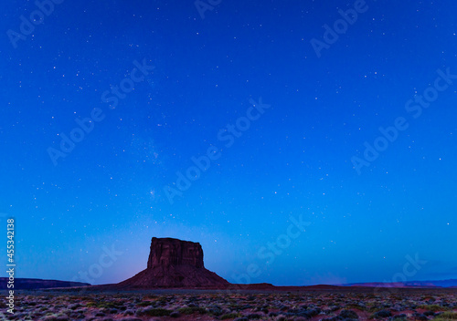 Mitchell Butte at Monument Valley with milky way above.  photo