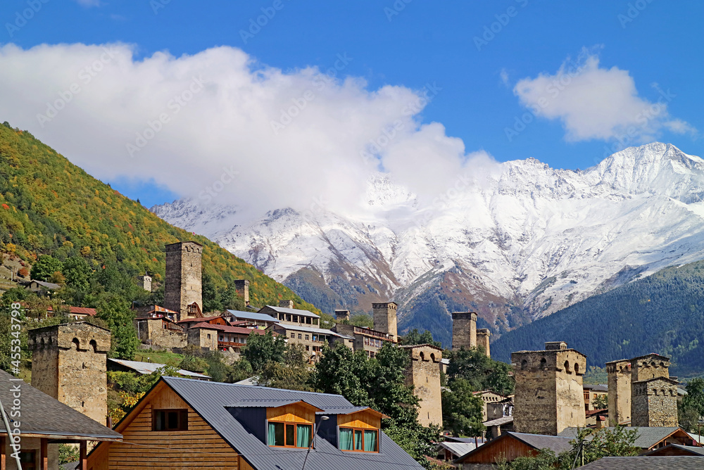 Amazing Medieval Svan Tower-houses in the Town of Mestia with Snow-capped Caucasus Mountain in the Backdrop, Svaneti Region of Georgia