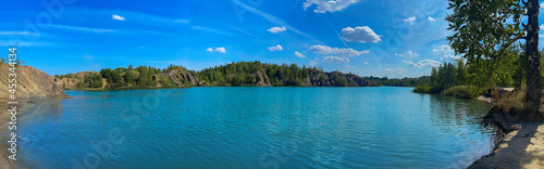 Landscape long banner. Panorama. Blue lake in summer Europe. Nature background.