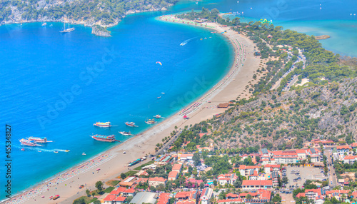 Holidaymakers sunbathing at Oludeniz beach  Fethiye Turkey
