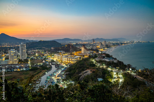 Twilight aerial view of Hua Hin, a famous tourist attraction of the upper southern part of Thailand. This photo was taken from Khao Takiab Mountain.