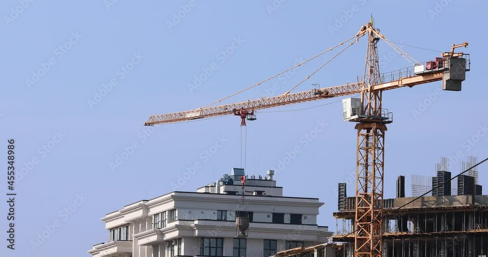 Сrane working on a construction site Сrane working on a construction site