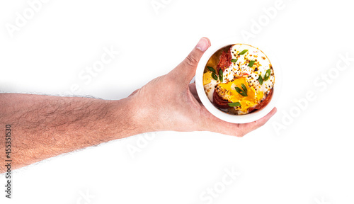 Eggs with sausage isolated on a white background. Baked scrambled eggs