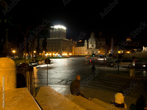 Piazza Venezia in the center of Rome at night.