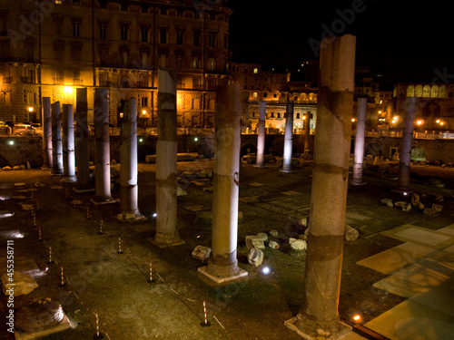 Ancient ruins in the center of Rome at night.