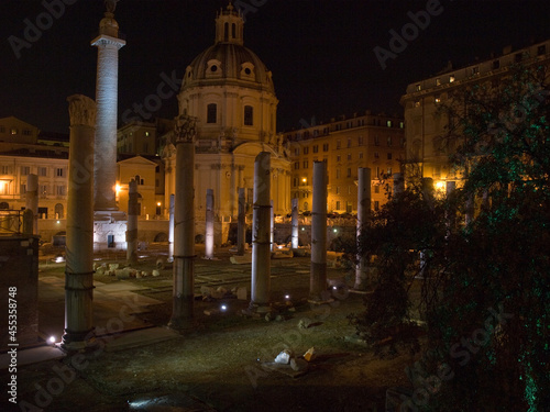 Ancient ruins in the center of Rome at night.