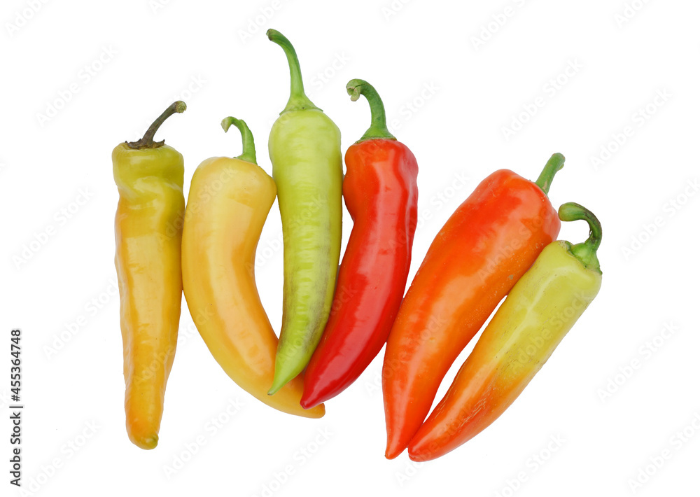 close up on fresh colorful peppers isolated on white background close up on fresh colorful peppers isolated on white background