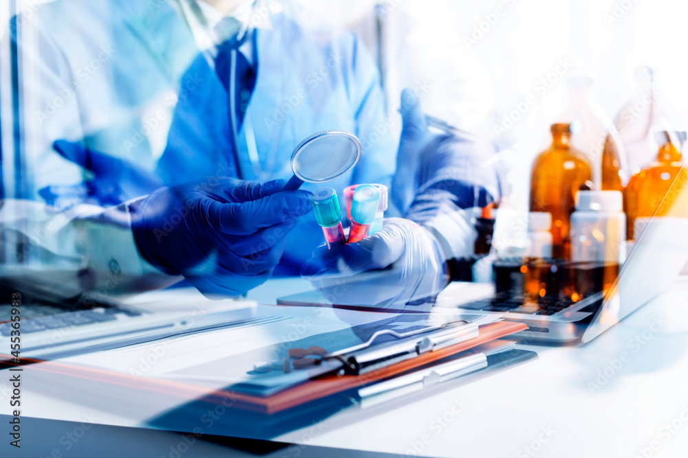 Health care researchers working in life science laboratory and analyzing microscope slides in research lab. New Epidemic Corona Virus. Corona virus outbreaking. Health care researchers working in life science laboratory and analyzing microscope slides in research lab. New Epidemic Corona Virus. Corona virus outbreaking.