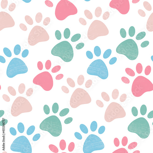 Cute bright seamless pattern with crayon pencil textured pet paw in pastel colors. Vector background with dog or cat leg footprint track silhouette. Animal childish textile design, wallpaper.